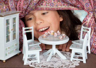 Tea in a dollhouse clipart