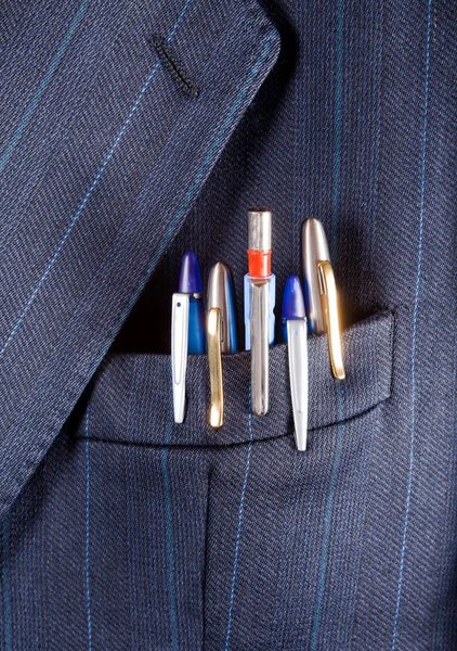 Penne i en lomme - Stock-foto