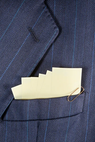 Notas pegajosas em um bolso — Fotografia de Stock