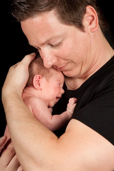 Abrazando bebé — Foto de Stock