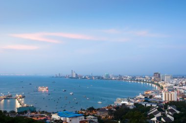 Aerial view over Pattaya at dusk clipart