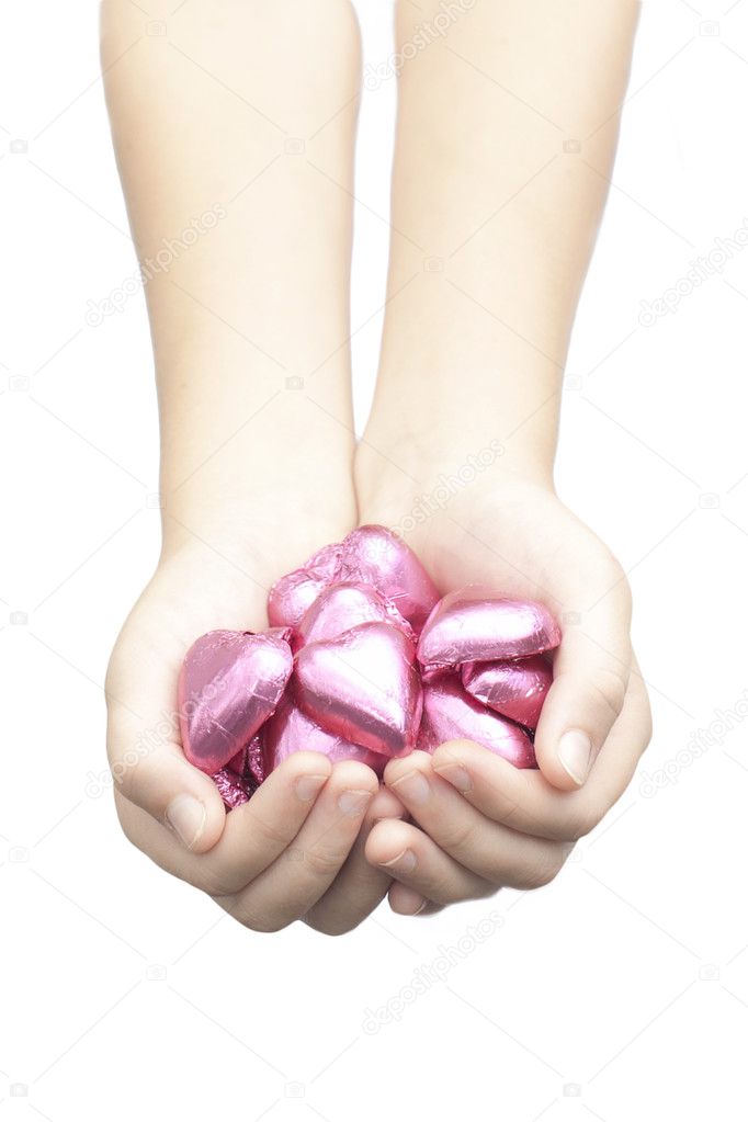 Chocolate hearts in hand