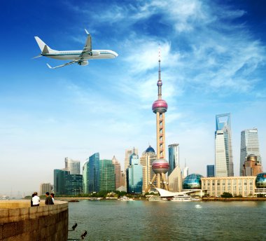 Aircraft on the Shanghai sky clipart