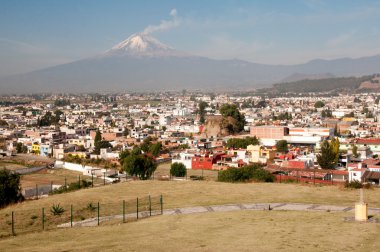 Popocatepetl volcano seen from Cholula Mexico clipart