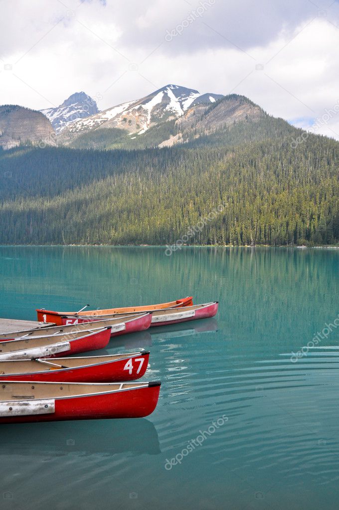 Canoes on beautiful tourquoise lake