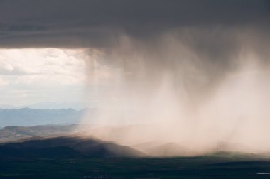 Rain Storm over Aizkorri range , Basque Country (Spain) clipart