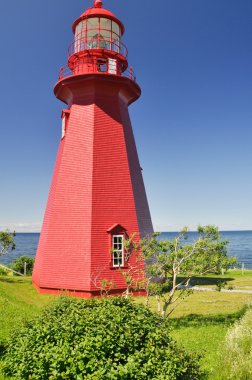 Lighthouse at La Martre in Quebec clipart