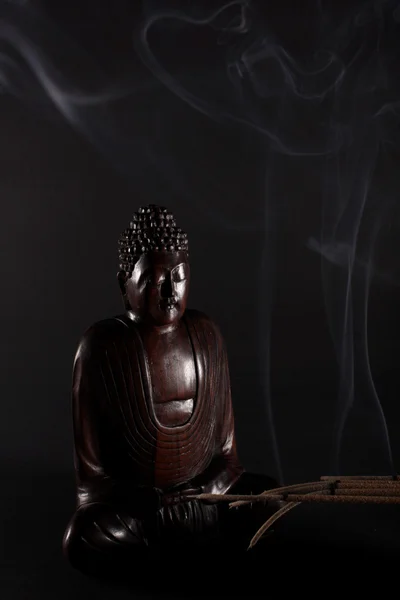 stock image Wooden Buddha meditating