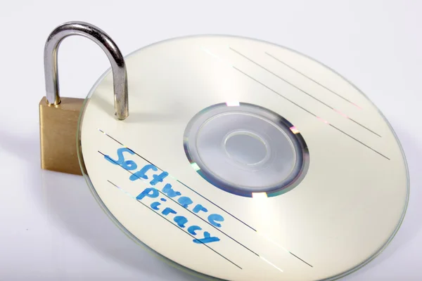 CD piratage avec cadenas Images De Stock Libres De Droits