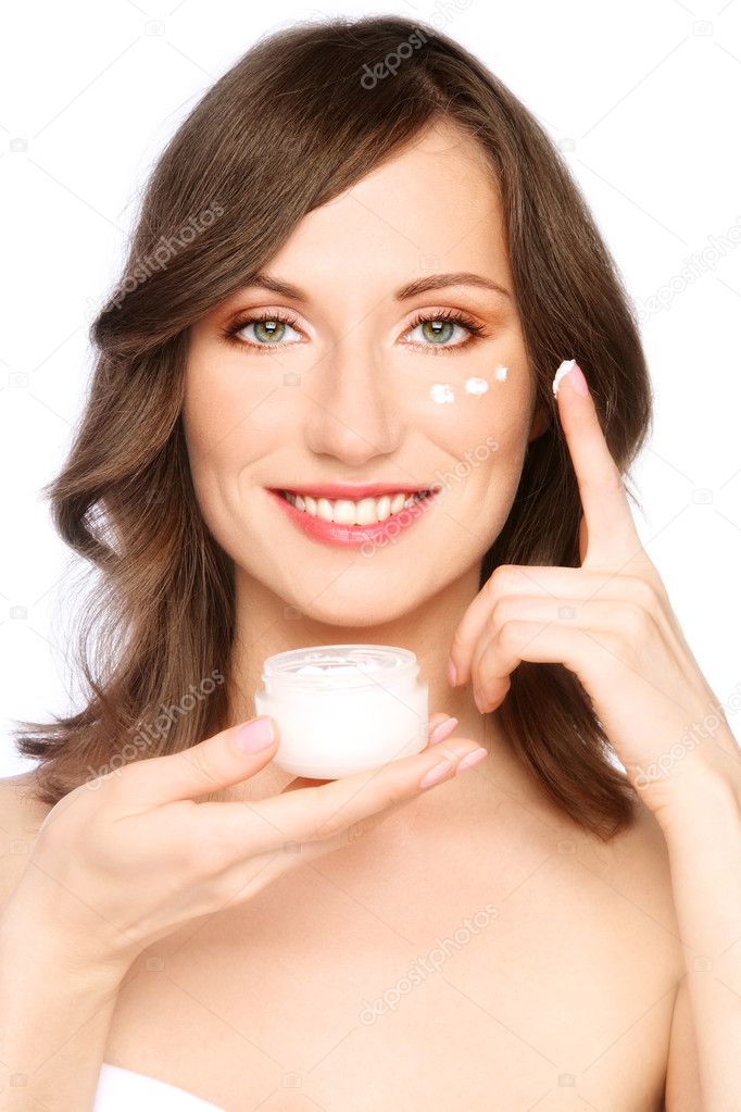 Woman applying cream