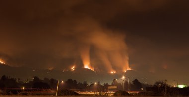 Fire Threatens Homes on Hillside clipart