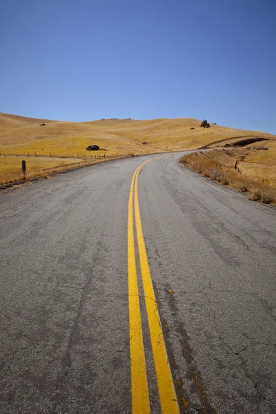 Carretera vacía en zona rural Tarde — Foto de Stock