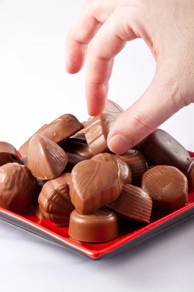 Ruční pořizování čokolády — Stock fotografie