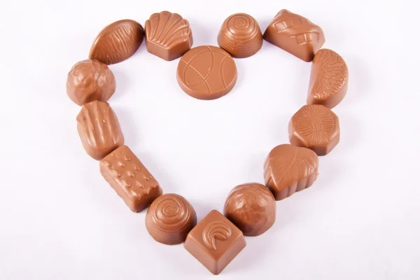 Čokoládové bonbóny ve tvaru srdce — Stock fotografie