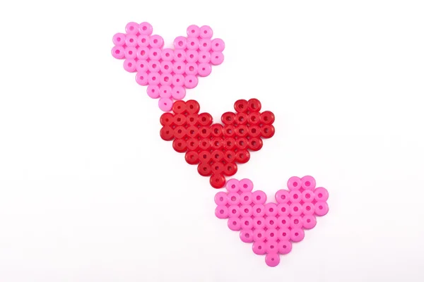 Diagonal Plastic Beaded Love Hearts — Stock Photo, Image