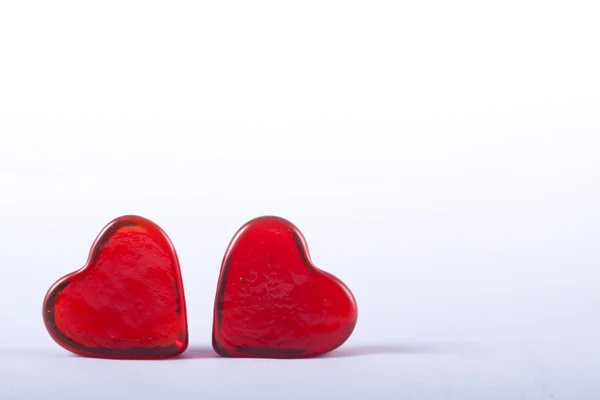Два червоних скляних серця Ліцензійні Стокові Зображення