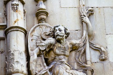 Warrior, facade of the University of Alcala de Henares, Madrid, Spain clipart