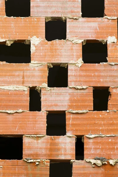 Parede de tijolo vermelho texturizado — Fotografia de Stock