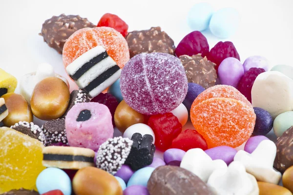 Many candy on white background.Fruit snacks — Stock Photo, Image