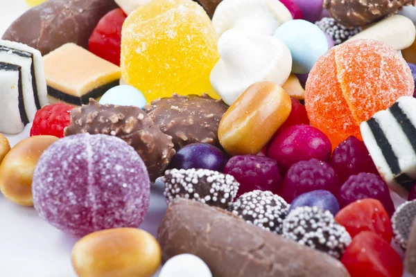Many candy on white background.Fruit snacks — Stock Photo, Image