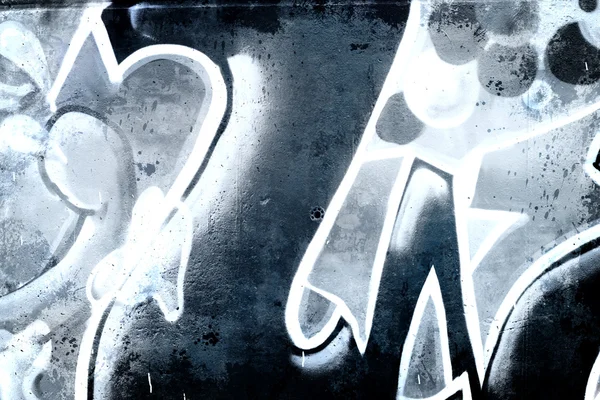Studené graffiti přes starou špinavou zeď, urban hip hop šedé pozadí — Stock fotografie