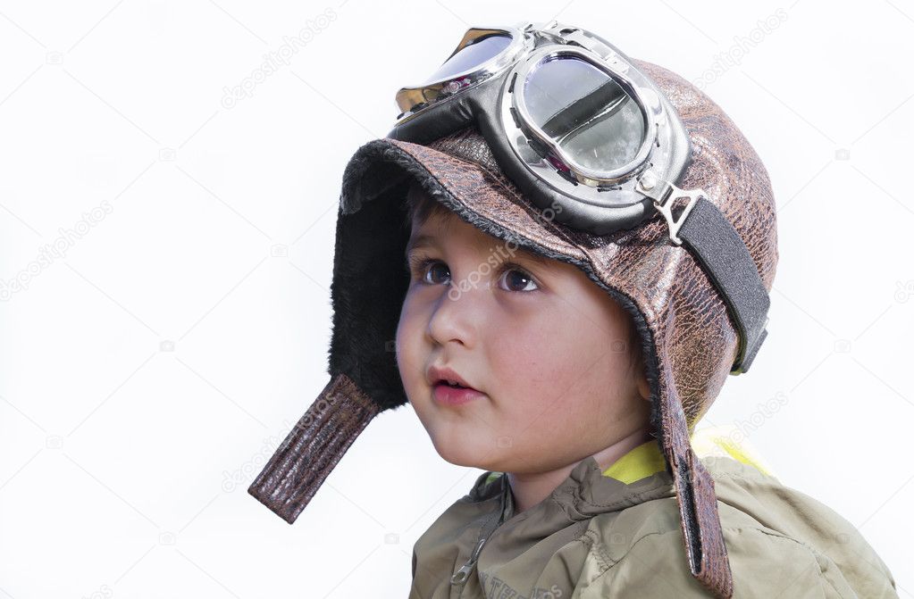 A little cute baby dreams of becoming a pilot. Pilot outfit, hat