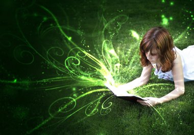 The pleasure of reading, a world of fantasy and imagination. clipart