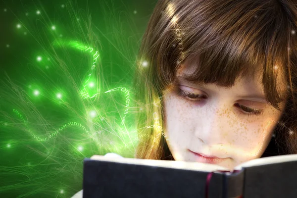 stock image Young beautiful girl reading a book, fantasy reading
