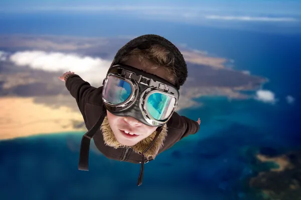 Boy flying, daydreaming he is a pilot — Stock Photo, Image