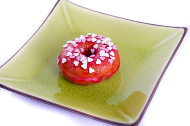 bir plaka üzerinde renkli donut