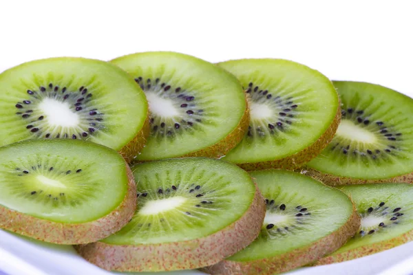 stock image Kiwi slices on white plate