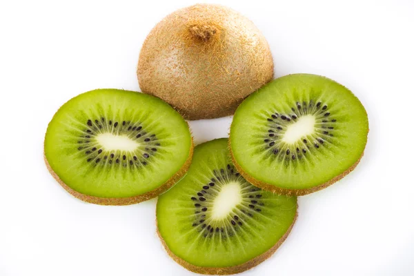 Stock image Kiwi slices on white plate