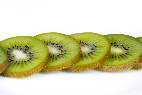 stock image Kiwi slices on white plate