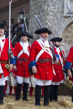 Defence and attack the castle during the re-enactment of the War clipart