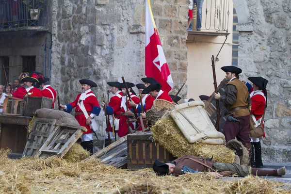 Defence and attack the castle during the re-enactment of the War — Stock Photo, Image