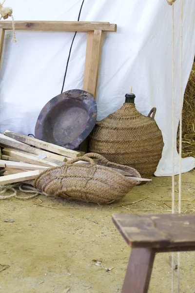 Military camp with arms and supplies during the re-enactment of — Stock Photo, Image