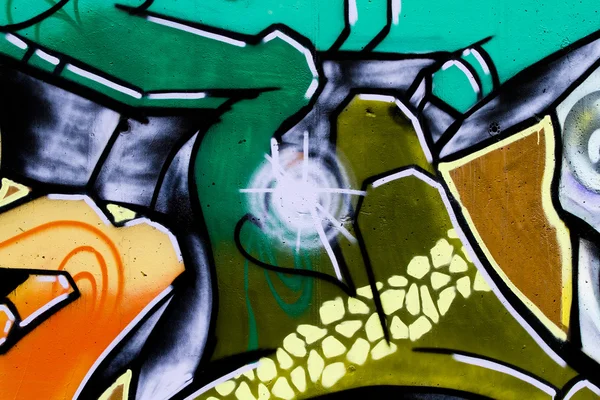 Straatkunst, segment van een stedelijke grafitti op de muur — Stockfoto