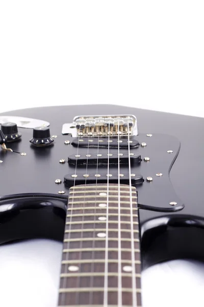 सफेद पृष्ठभूमि पर काले इलेक्ट्रिक गिटार — स्टॉक फ़ोटो, इमेज