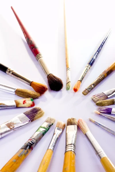 Används penslar i olika färger — Stockfoto