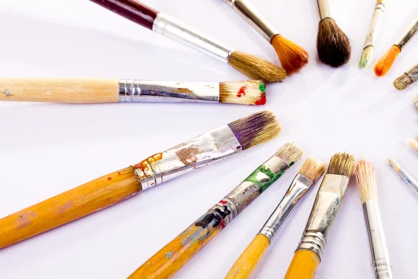 Används penslar i olika färger — Stockfoto
