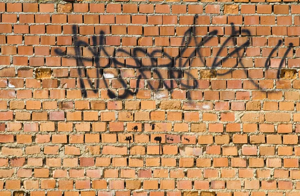 Graffiti na ścianie cegieł, miejski obraz — Zdjęcie stockowe
