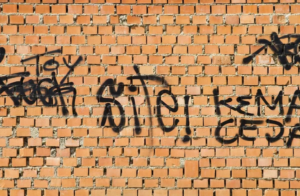 落書きのレンガ壁、都市の画像 — ストック写真