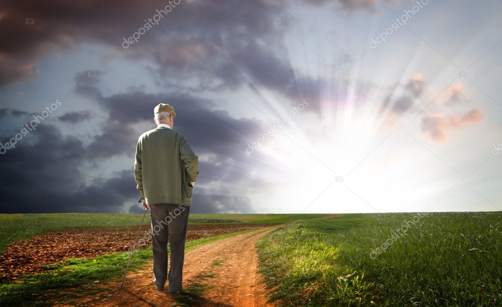 Old man walking his path