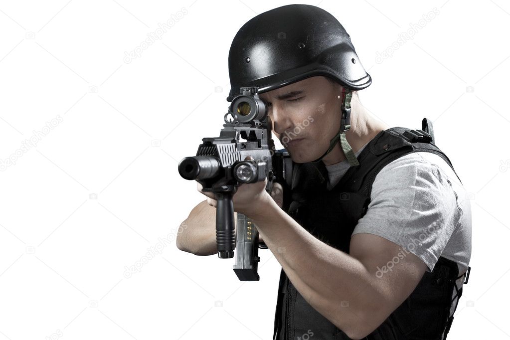 Armed policeman shooting, isolated on white