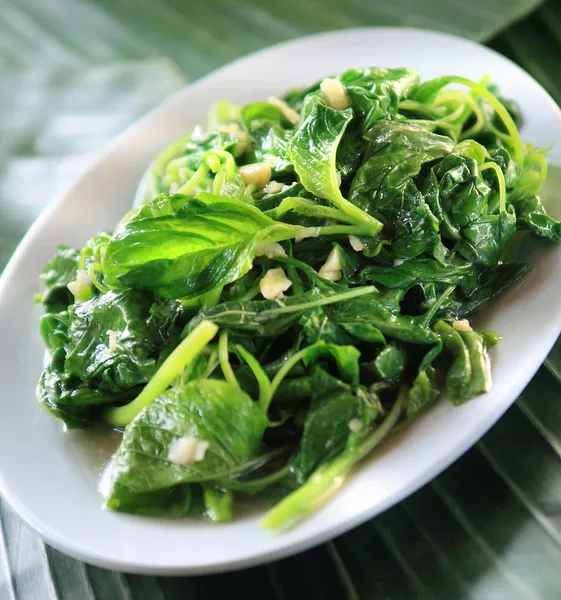 Stir fried water spinach with garlic — Stock Photo, Image