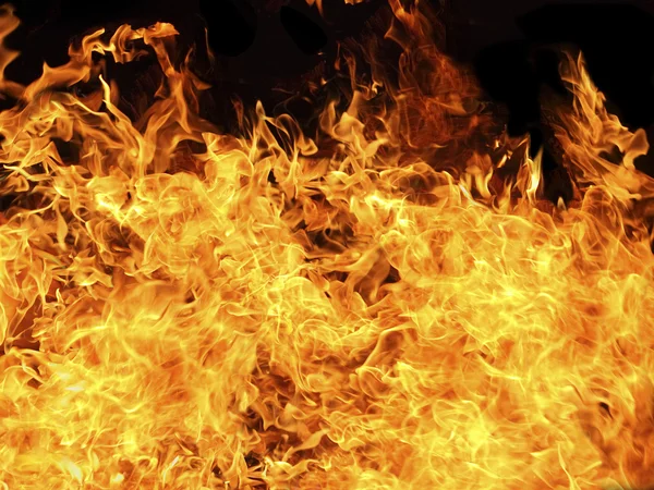 Alev alev yanan ateş arka plan — Stok fotoğraf