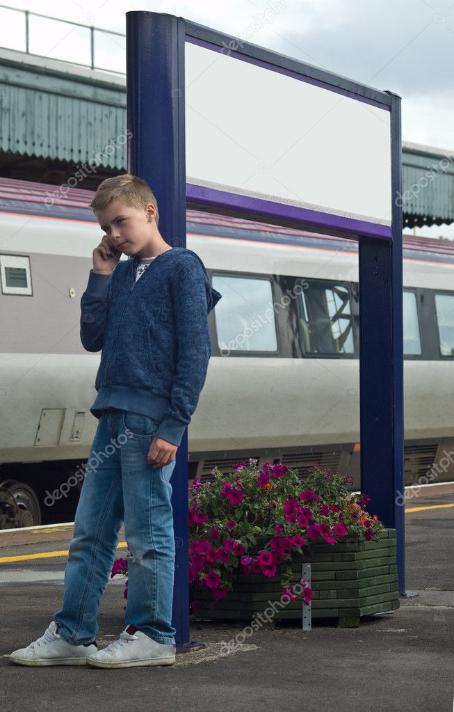 Young boy on mobile phone