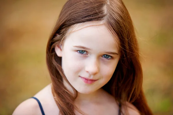 A young six year old girl outdoors — Stock Photo, Image