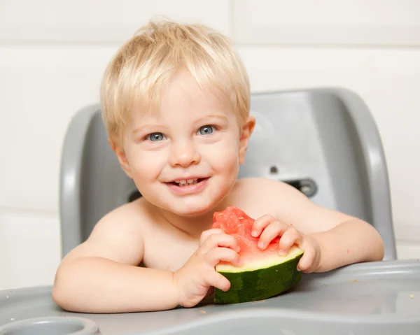 A adorable toddler eats watermelon Zdjęcia Stockowe bez tantiem
