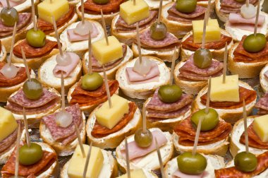 Party appetizers on wooden sticks clipart